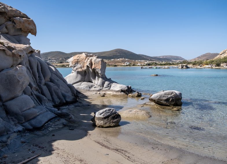 Paros island Kolymbithres beach Cyclades Greece. Empty sandy beach blue sky calm sea. Sunny day